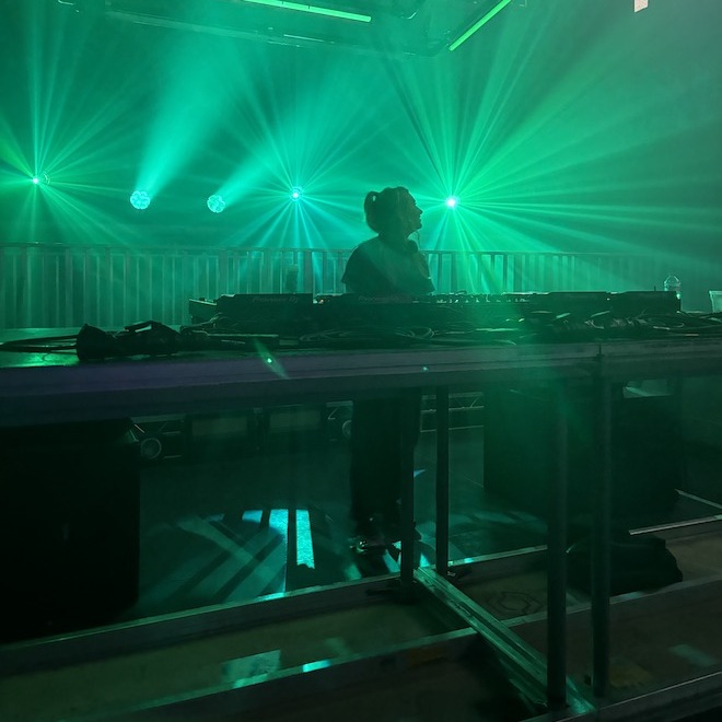 A photograph of myself DJing